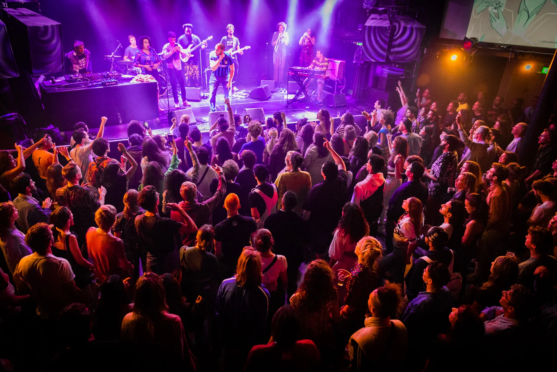 AfroGrooves performing for a full crowd